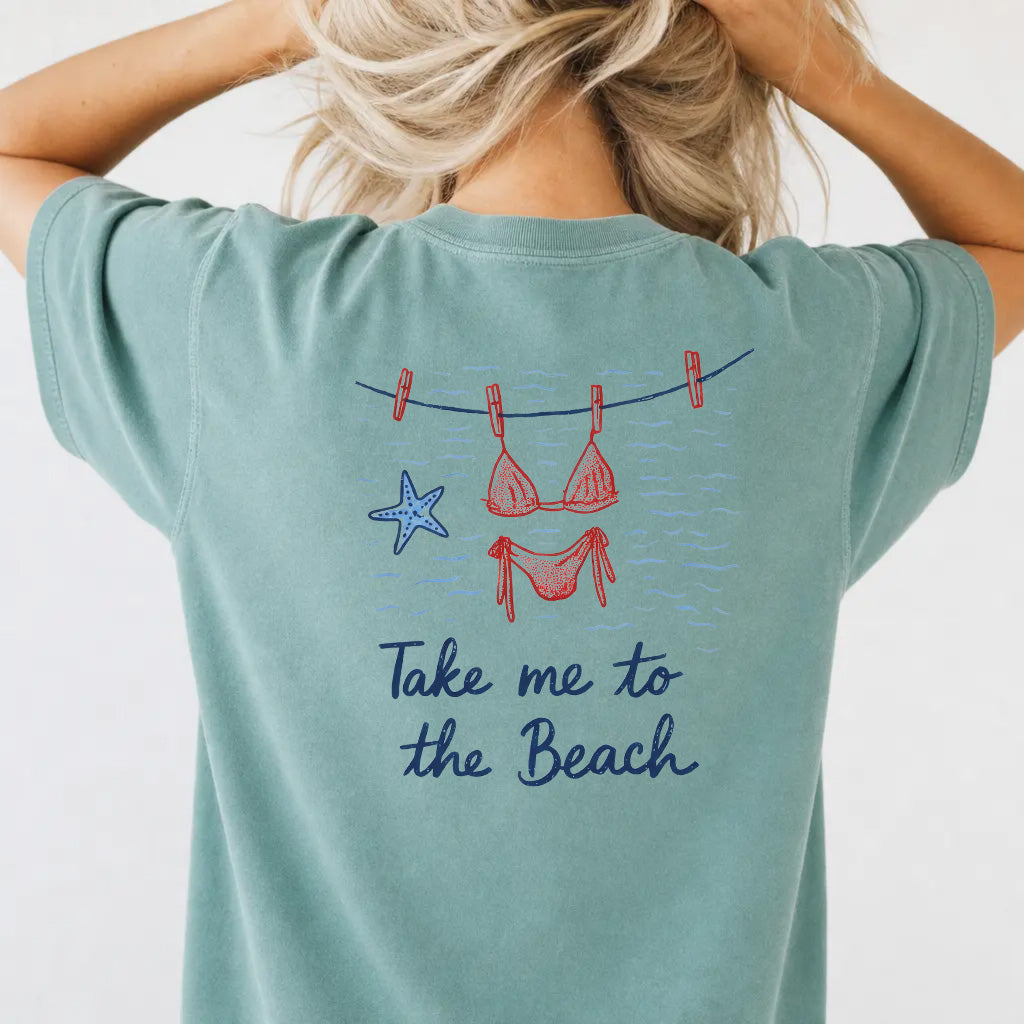 Woman wearing a seafoam beach vacation graphic tee with bikini clothesline back print