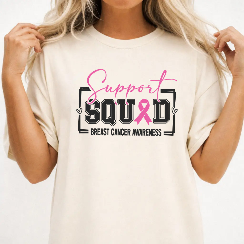 Woman wearing an ivory breast cancer awareness women&