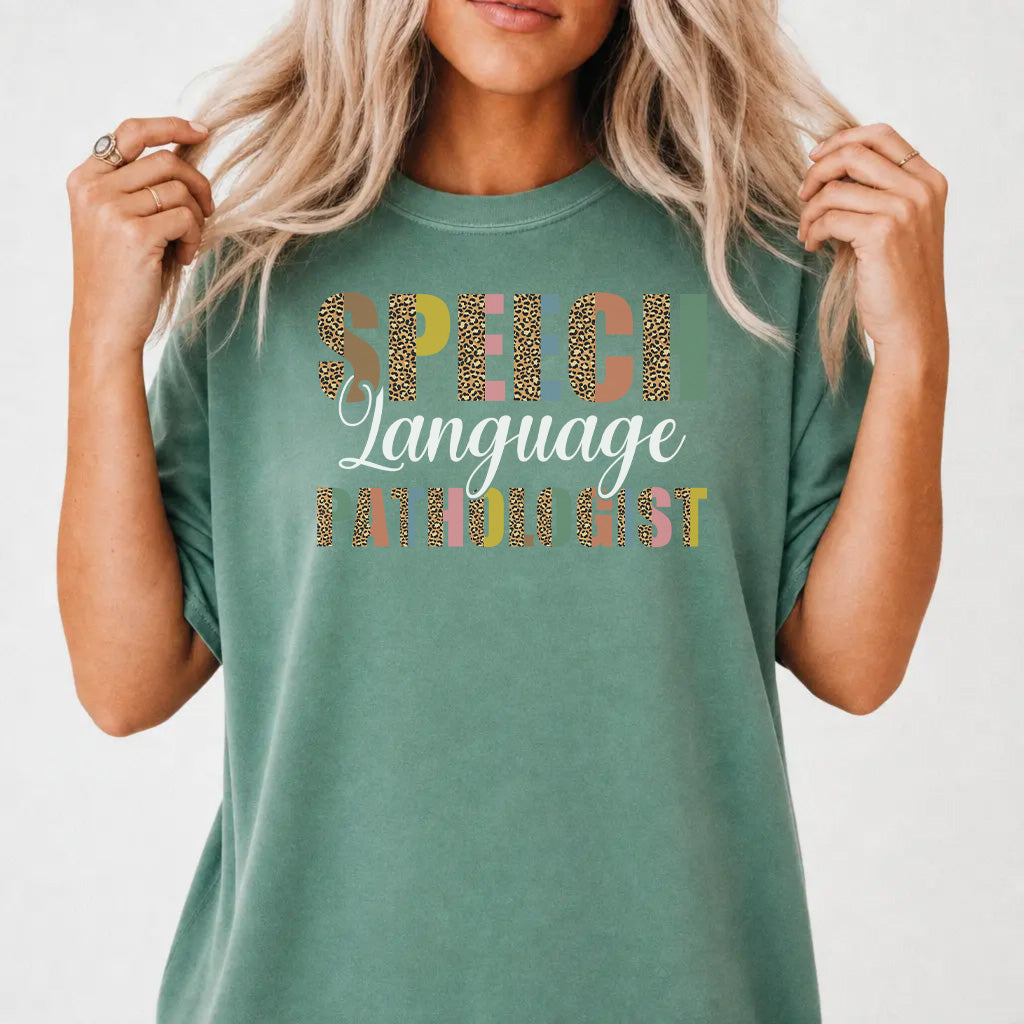 Woman wearing a light green colorful SLP speech language pathologist women&