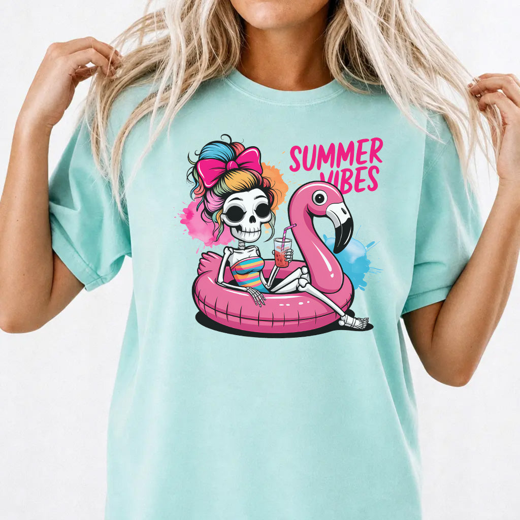 Woman wearing a chalky mint flamingo pool float skeleton women&