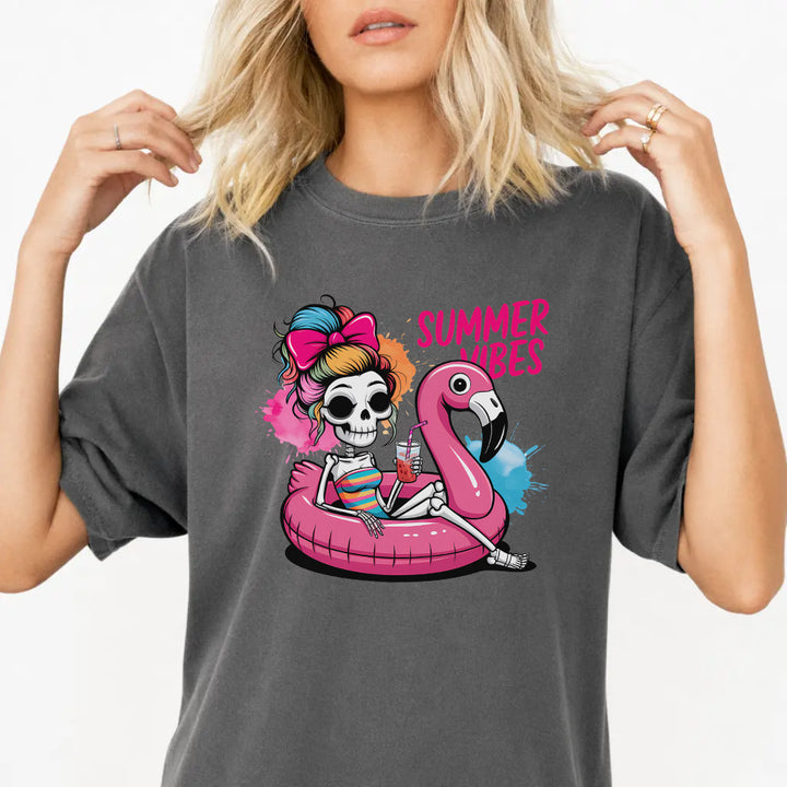 Woman wearing a pepper flamingo pool float skeleton women&