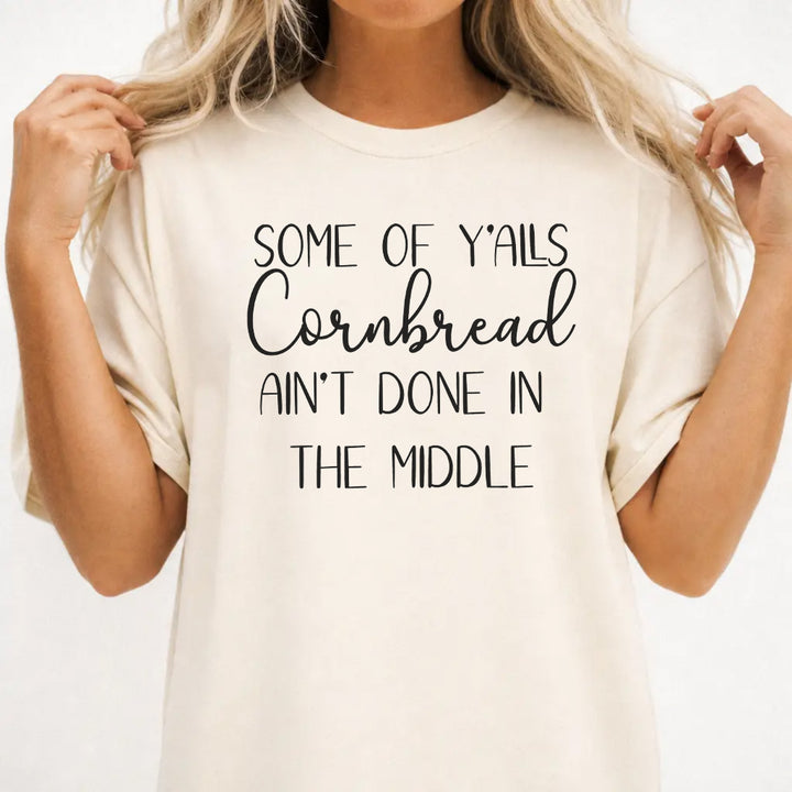 Woman wearing an ivory funny southern saying women&