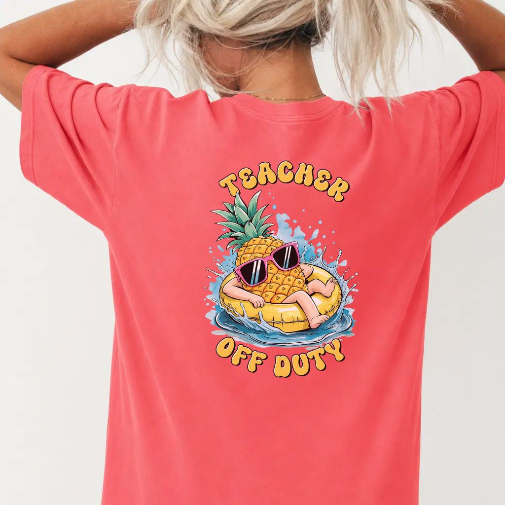 Woman wearing a watermelon red funny teacher graphic tee with pineapple pool float back print