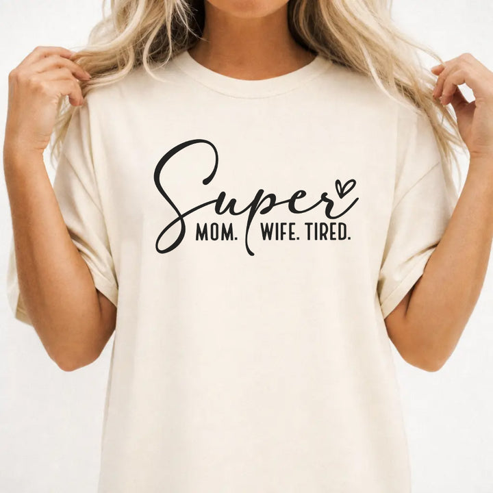 Woman wearing an ivory funny tired mom women&