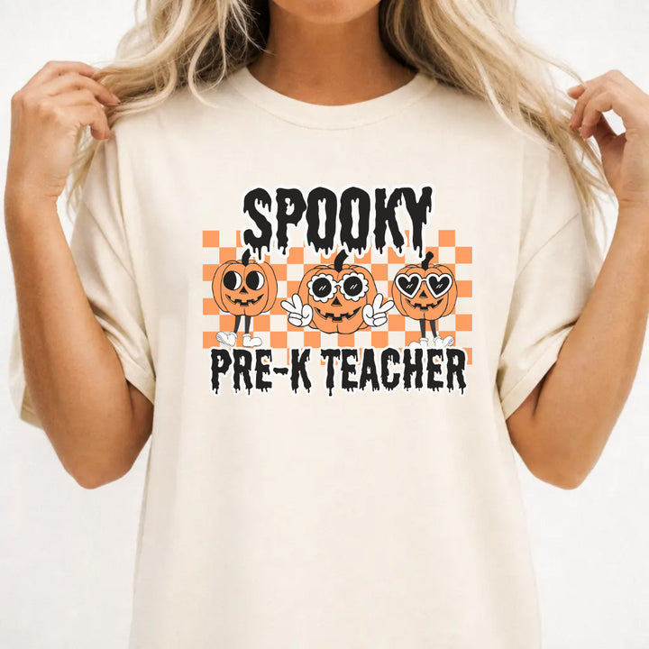Woman wearing an ivory halloween pre-k teacher women&