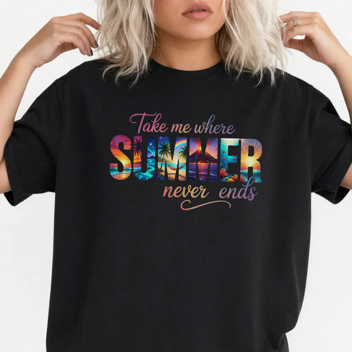 Woman wearing a black oversized tropical summer graphic tee with sunset beach lettering