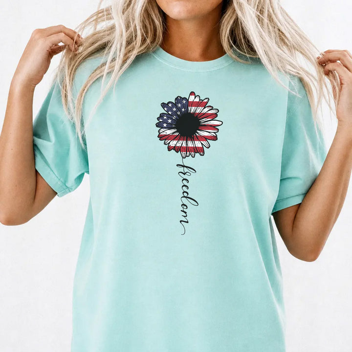 Woman wearing a chalky mint patriotic sunflower freedom women&
