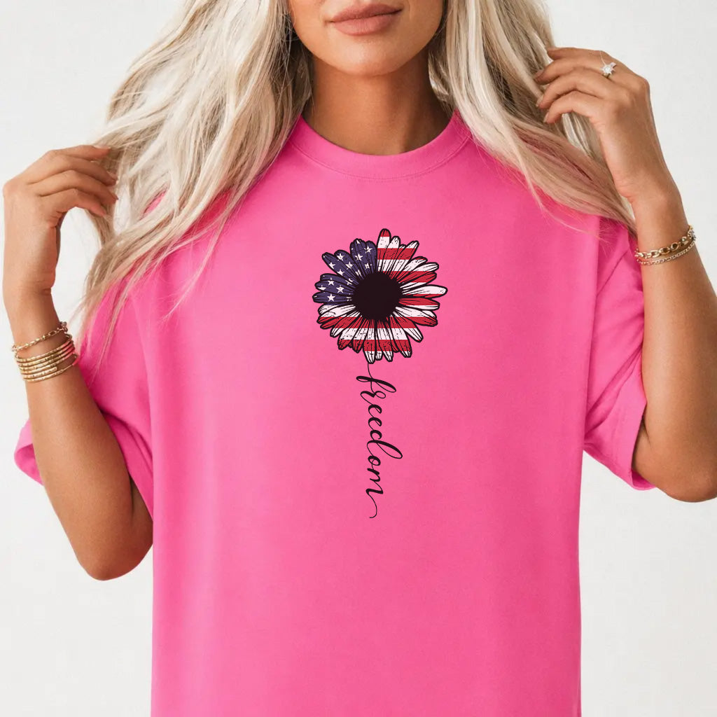 Woman wearing a neon pink patriotic sunflower freedom women&