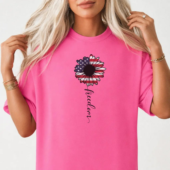 Woman wearing a neon pink patriotic sunflower freedom women&