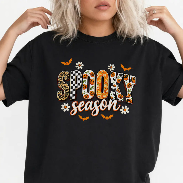Woman wearing a black retro halloween pumpkin women&