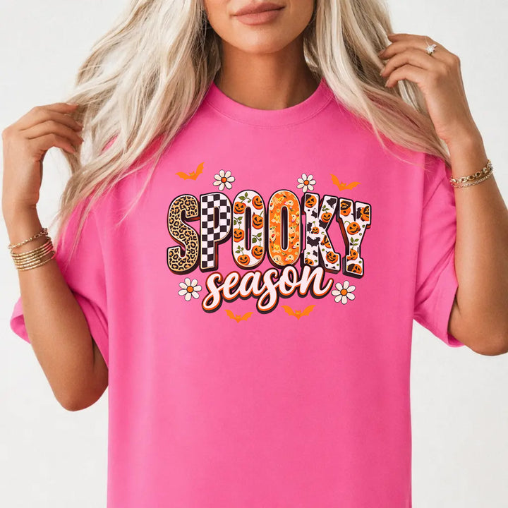 Woman wearing a neon pink retro halloween pumpkin women&