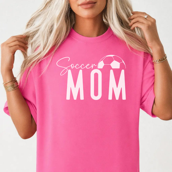 Woman wearing a neon pink soccer mom women&