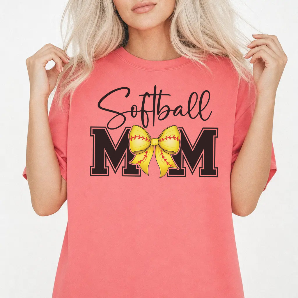 Woman wearing a watermelon-colored softball mom bow women&