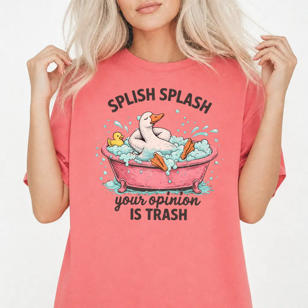 Woman wearing a watermelon graphic tee with a goose in a bubble bath and the phrase Splish Splash Your Opinion Is Trash on the front