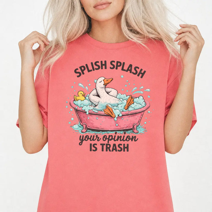 Woman wearing a watermelon graphic tee with a goose in a bubble bath and the phrase Splish Splash Your Opinion Is Trash on the front