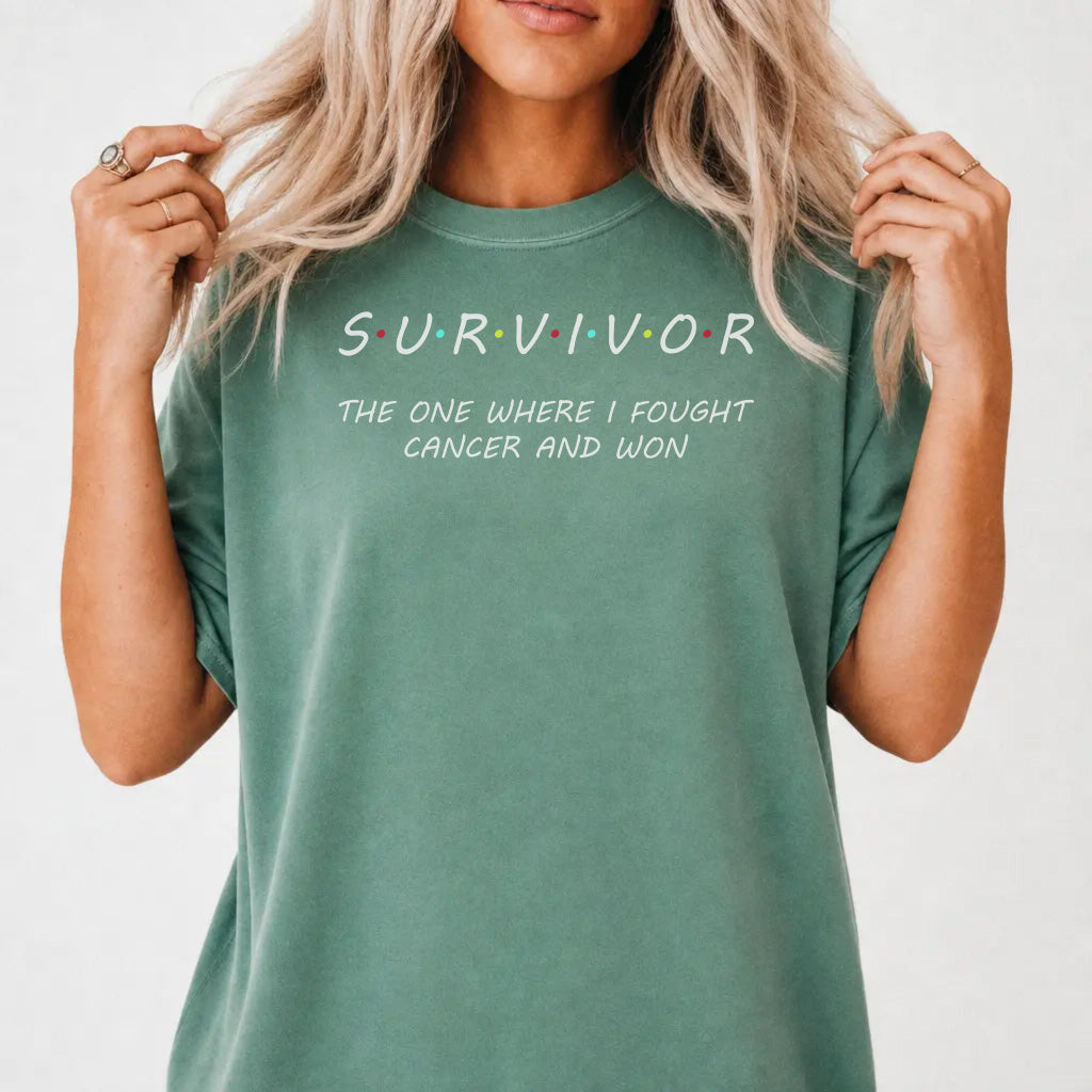 Woman wearing a light green Survivor graphic tee that reads The One Where I Fought Cancer and Won